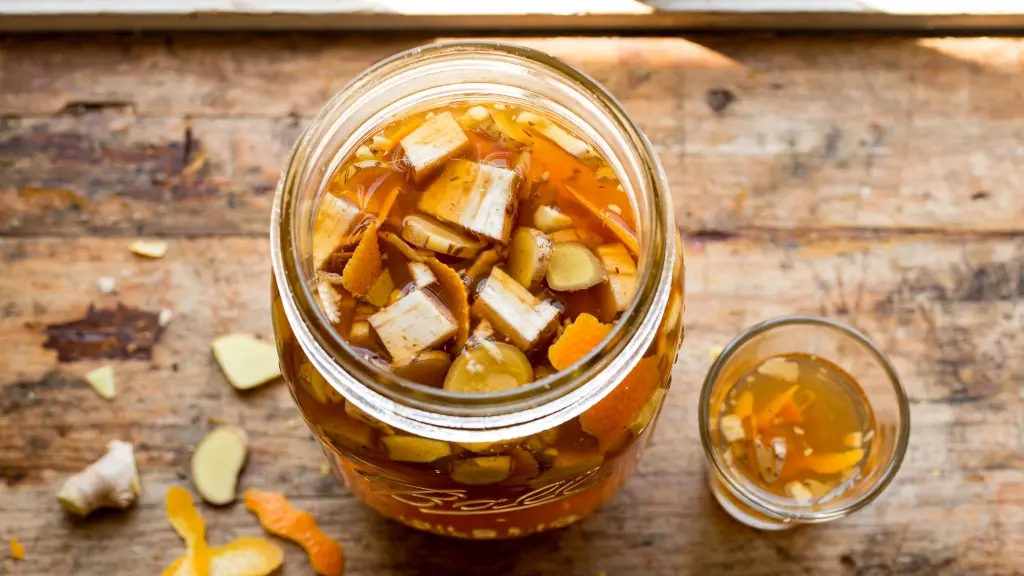 The Best Fire Cider Recipe (Ready in 15 Minutes, No Special Equipment Needed) 1 Fire cider recipe in a mason jar with fresh ginger, horseradish, and citrus